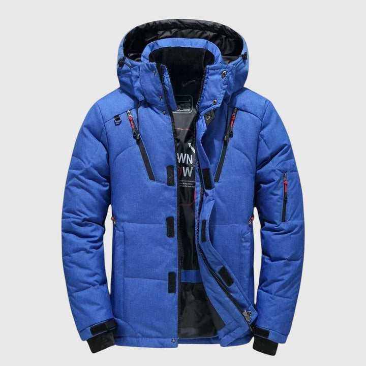 André – Prošívaná bunda s kapucí a technickými detaily