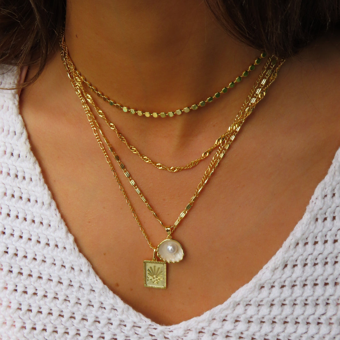 Náhrdelník s designem mušle